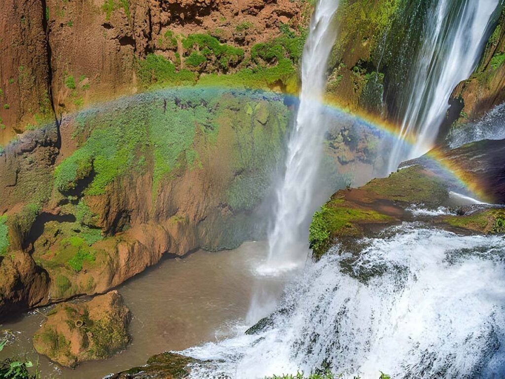 Rainbow in the spray at the foot of the Ouzoud Waterfalls