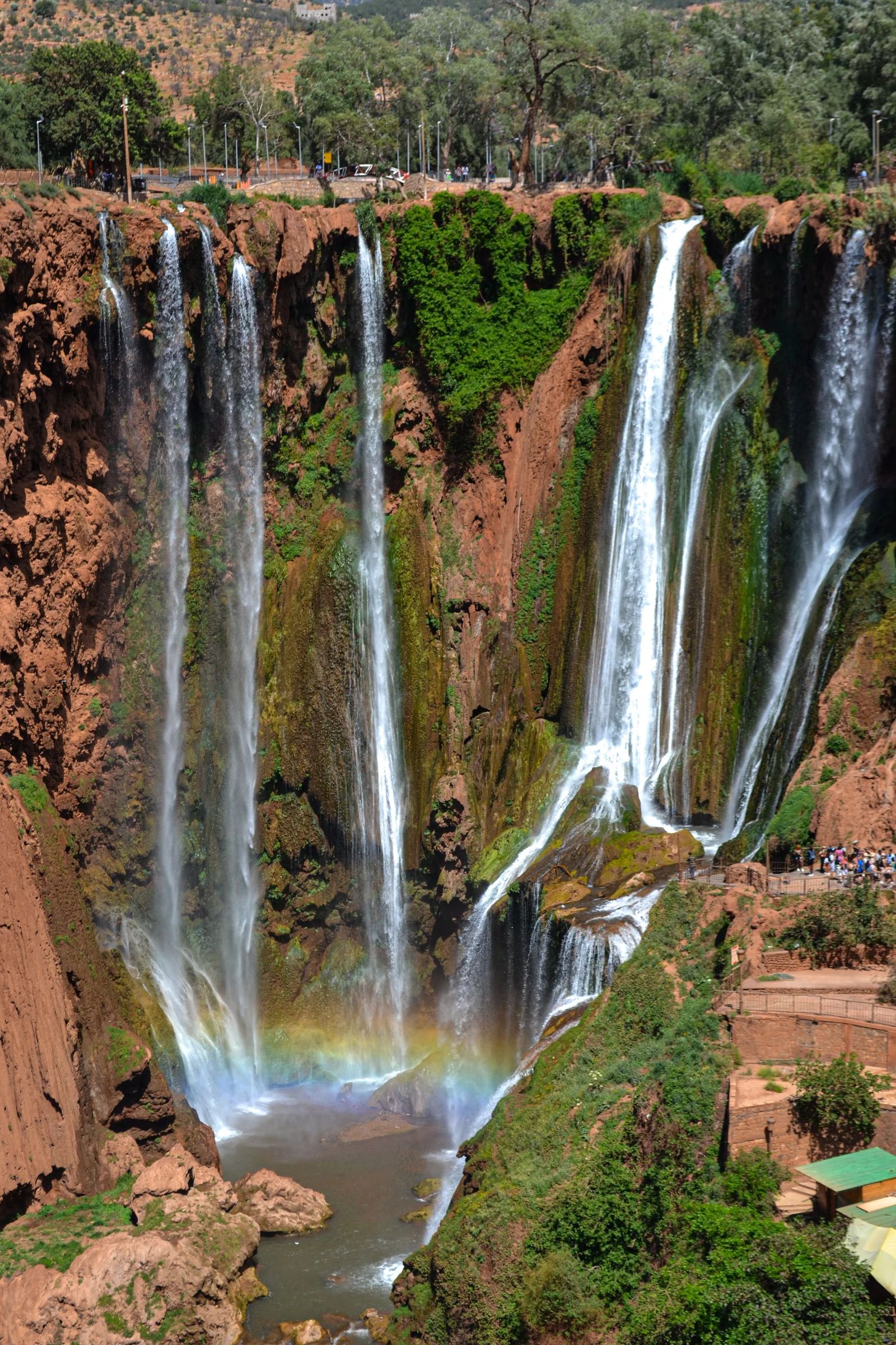 The main Ouzoud falls dropping in several streams with a rainbow at the bottom
